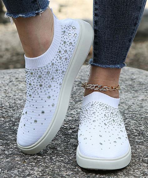 white sequin slip on sneakers.